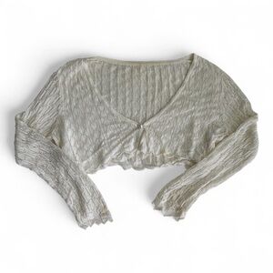 delicate cream knit bolero with faux pearl button